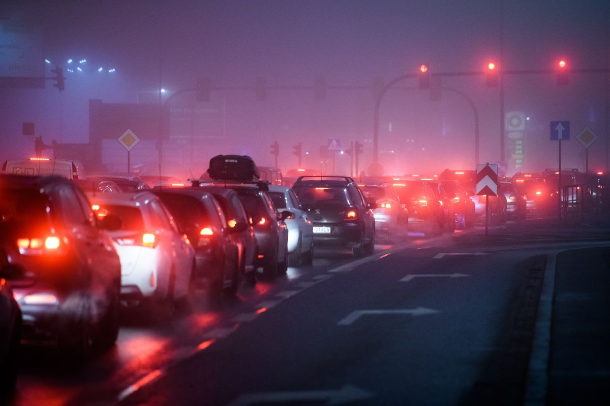 Traffic jam on the highway with an empty exit